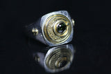  Silver signet ring with 18kt gold top featuring a green diamond and a granulated moon motif.