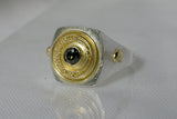 Silver signet ring with 18kt gold top featuring a green diamond and a granulated moon motif.